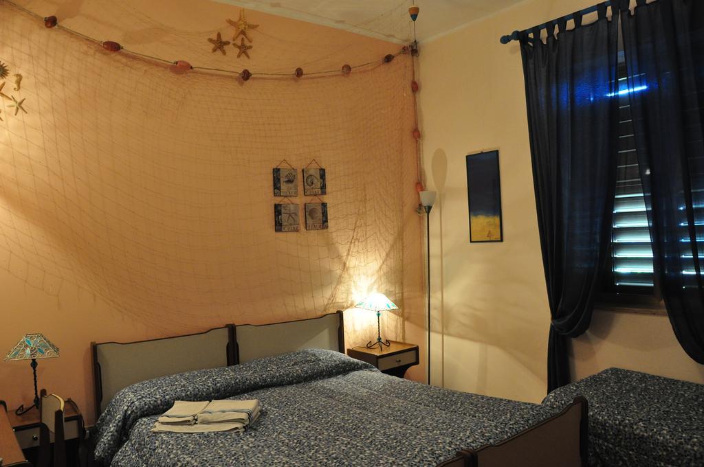 B&B Baia Delle Sirene จีอาร์ดีนี นักซอส ห้อง รูปภาพ